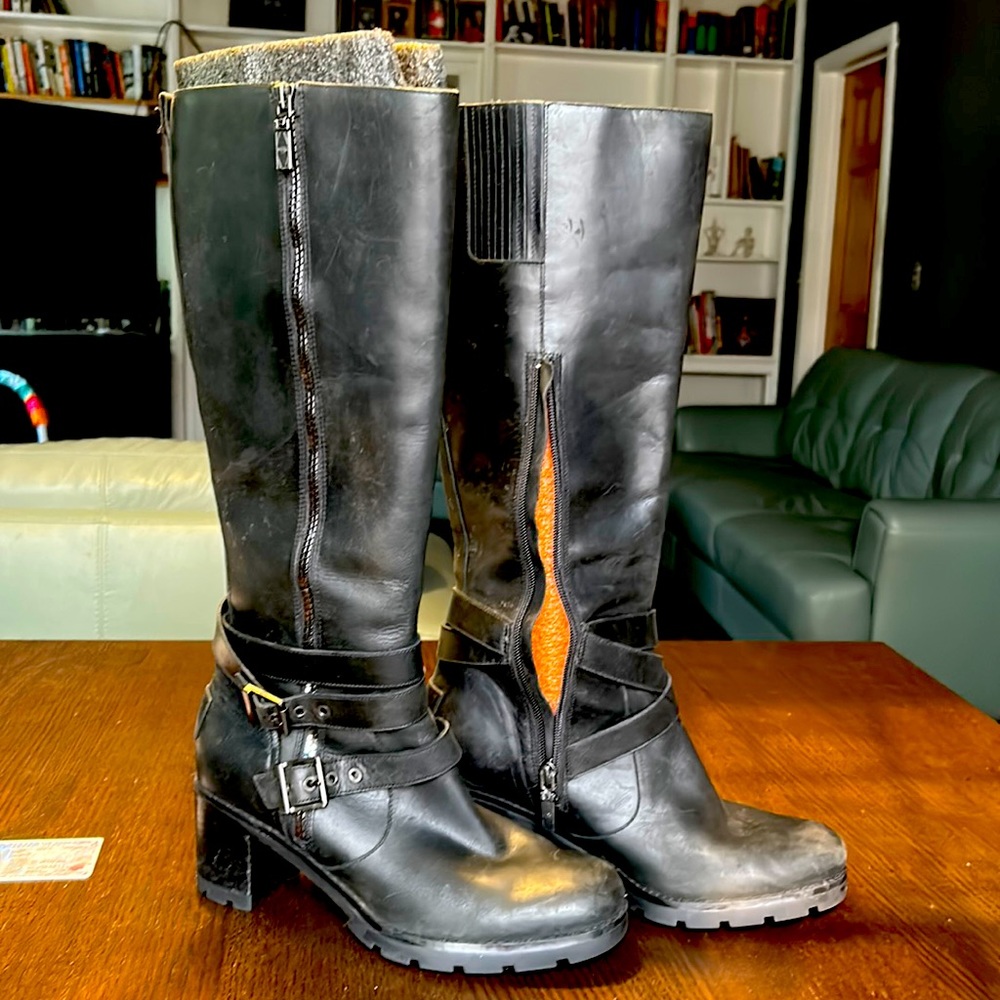 UGG boots black leather size 9.5 3 inch heels.